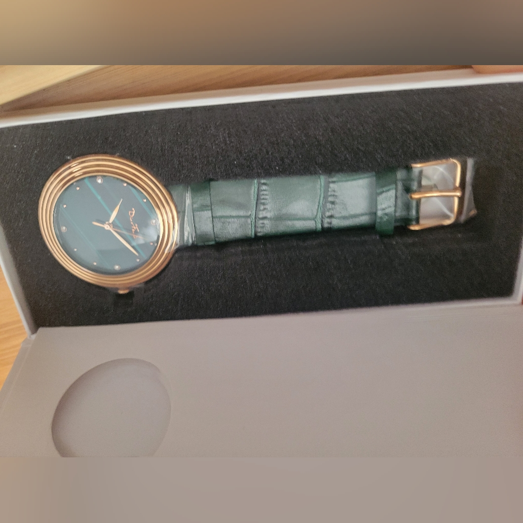 Elegant Green And Gold Watch